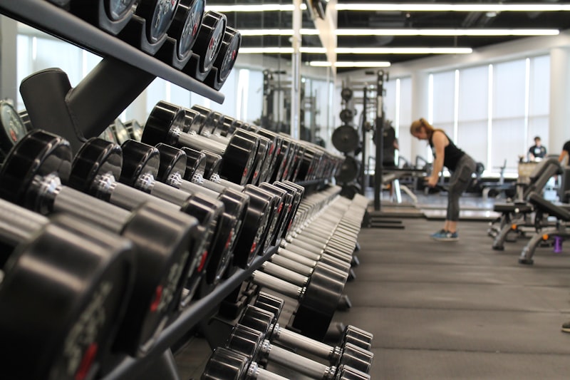 PRO Adjustable Dumbbell Set home gym weights on rack